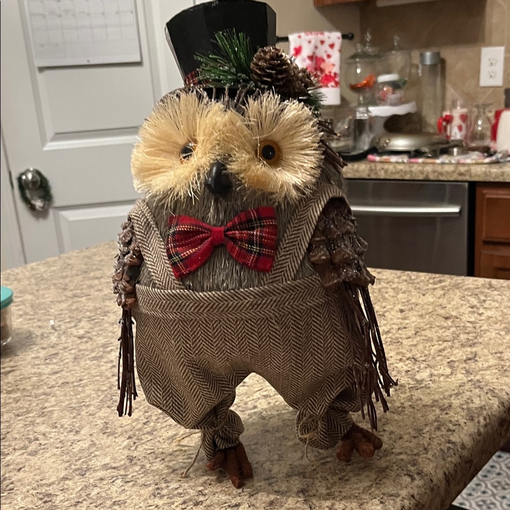 Festive Owl Figurine with Bow Tie
13 inches tall. 8 inches wide